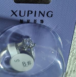 Faux engagement ring.